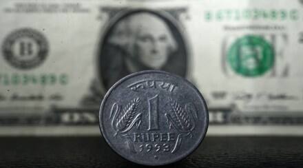 Rupee hits record low on month-end dollar demand